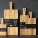 Set of 4 oak cutting boards with handle